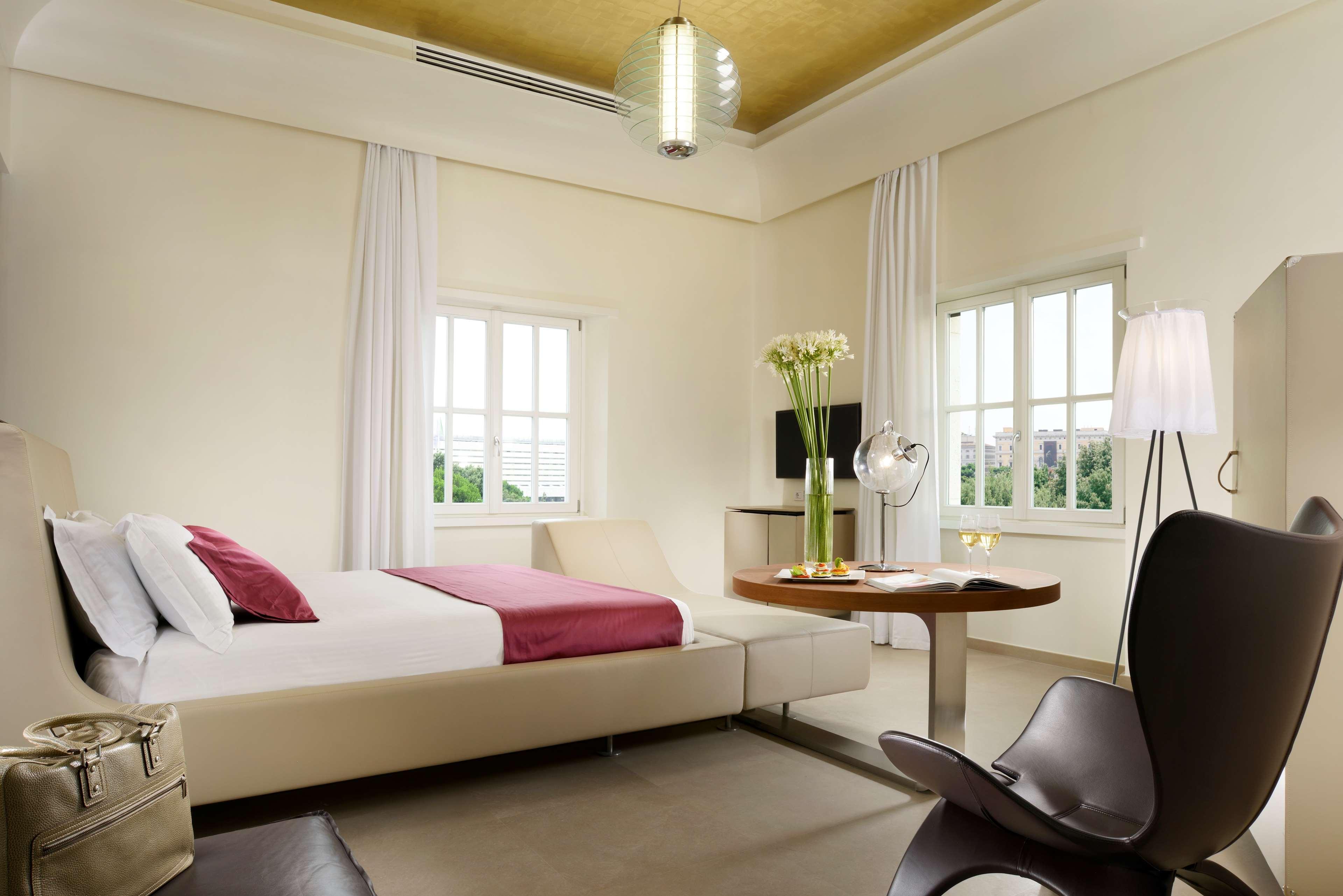 Palazzo Montemartini Rome, A Radisson Collection Hotel Eksteriør bilde A room at the Mandarin Oriental, Singapore