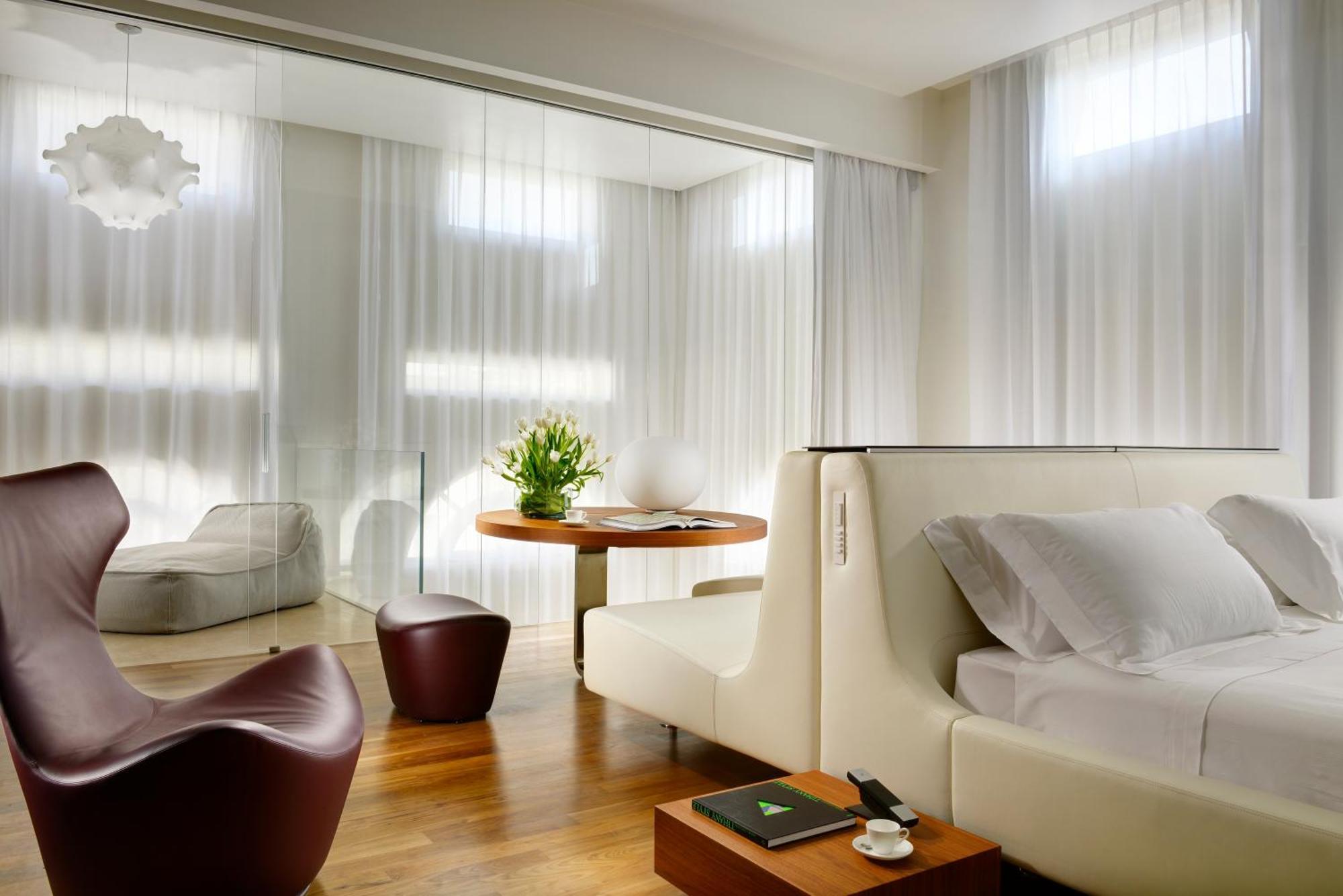 Palazzo Montemartini Rome, A Radisson Collection Hotel Eksteriør bilde A room at the Mandarin Oriental, Munich